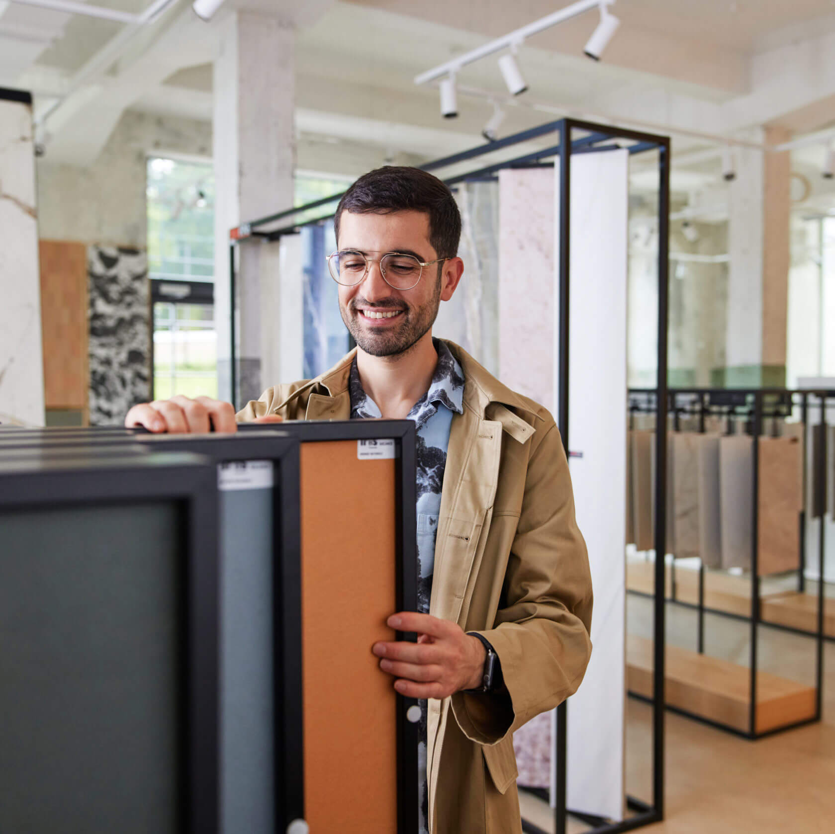 A person picking out materials for redecorating their home